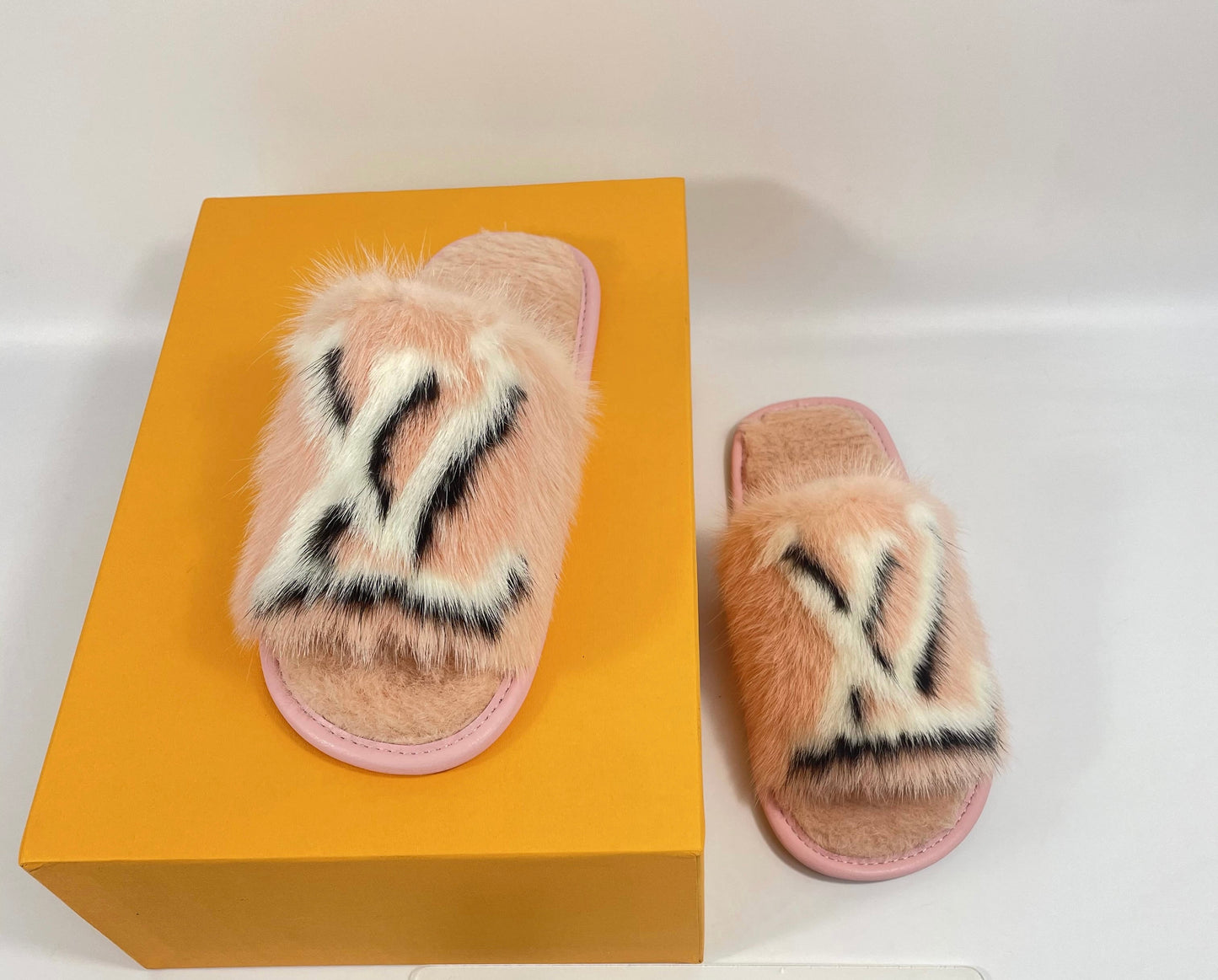 Louis Vuitton woman fur slides